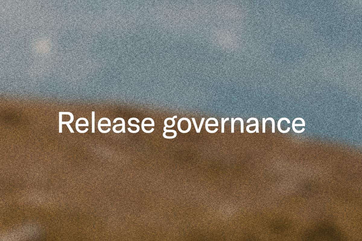 The words "Release governance" on a blurred blue and brown background
