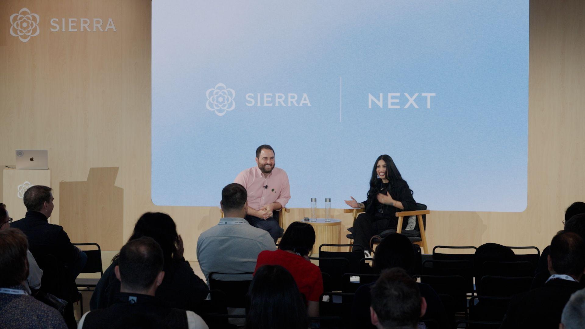 Sierra agent development and Next CX leader on stage