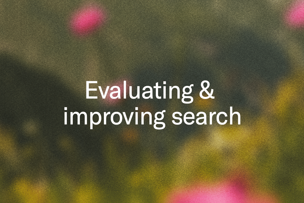 Text "Improving search" on a blurred green and pink background