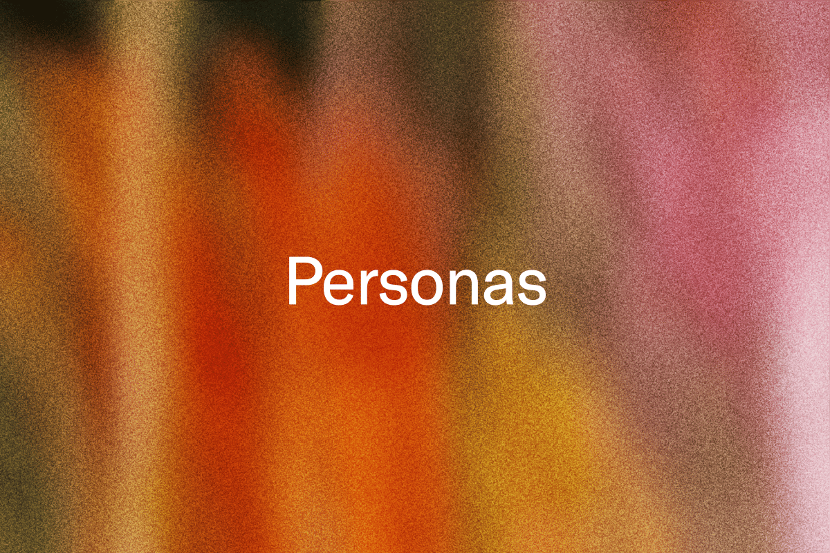 The word "Personas" on a blurred red, yellow and pink background