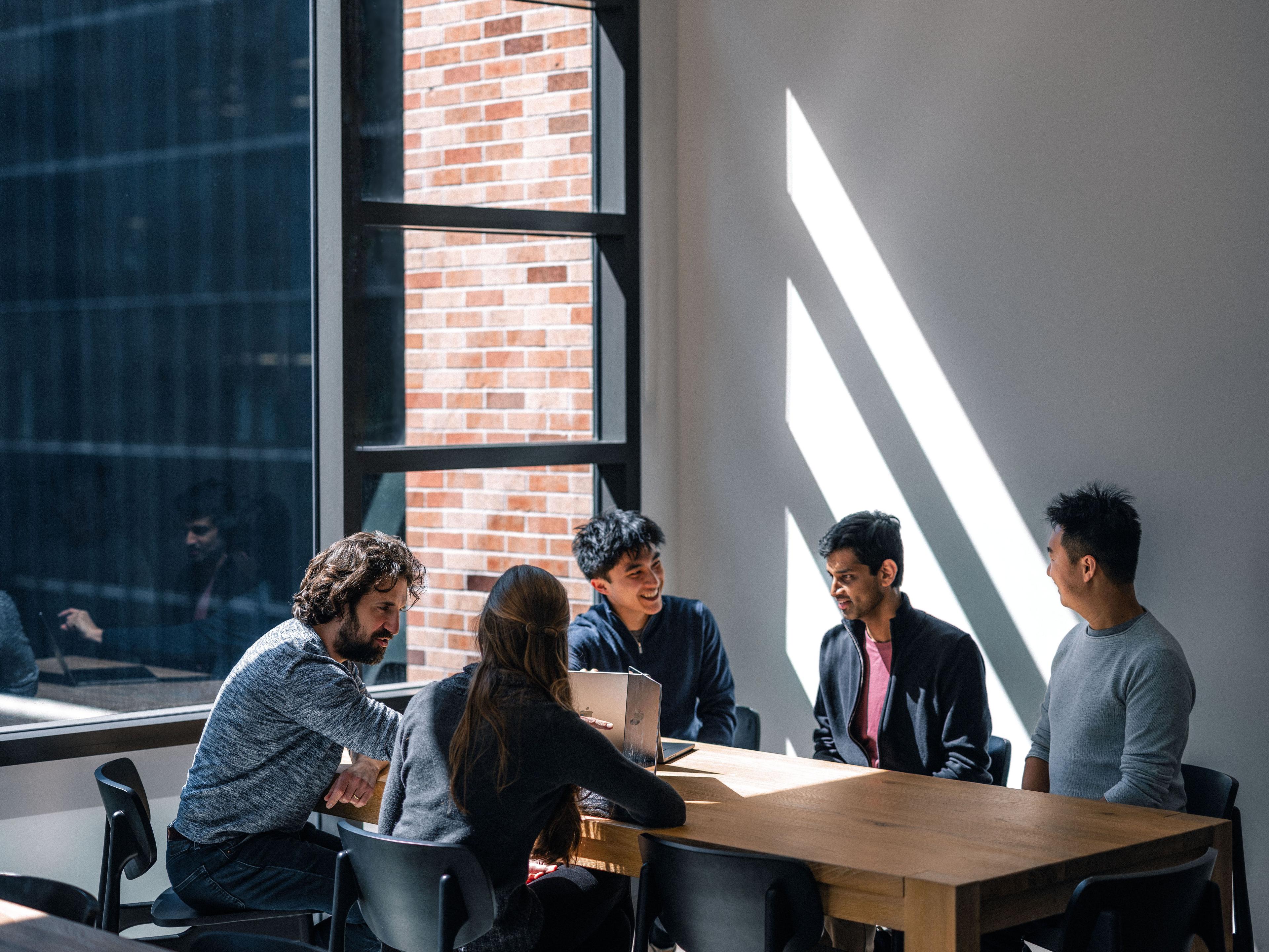 Sierra employees gathered in a meeting room