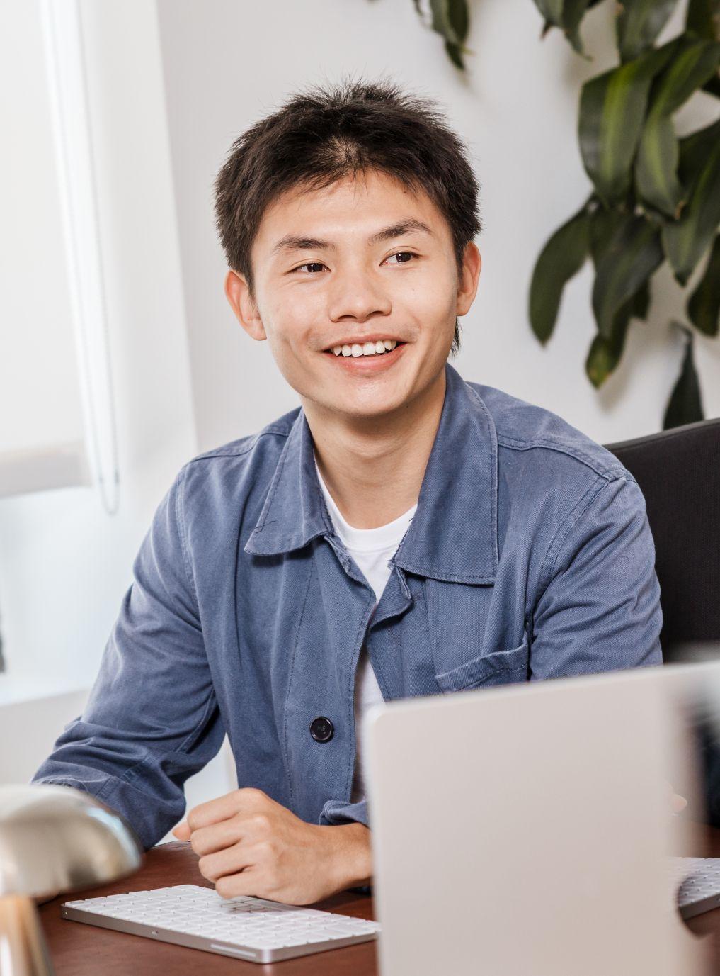 man sitting at desk