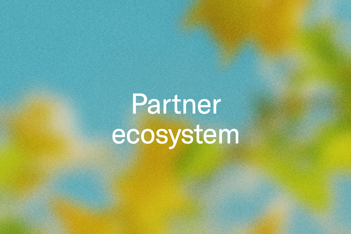 "Partner ecosystem" on a blurry blue yellow and green background