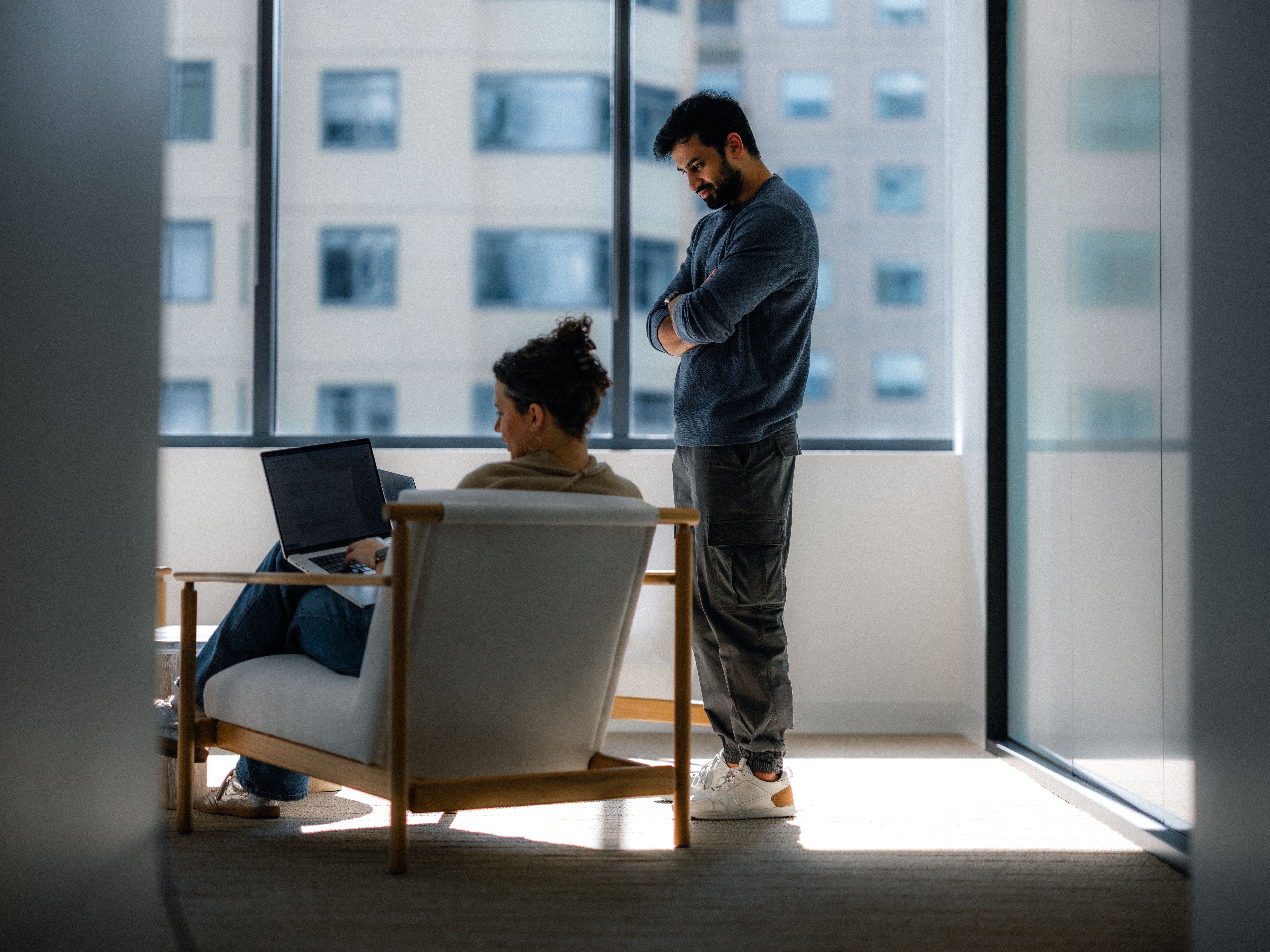 Sierra employees standing by the window